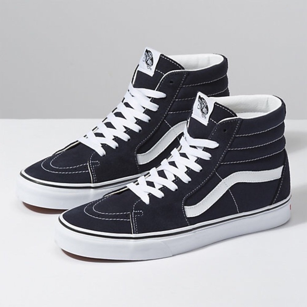 Woman’s Black High top vans